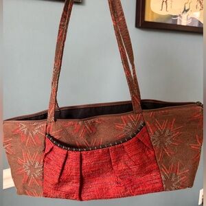 Maruca purse — rust red,teal blue, black, brown.